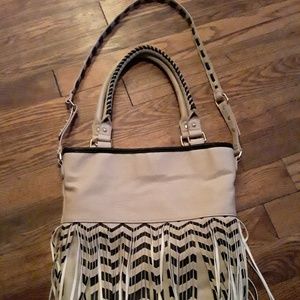 Steve Madden purse with fridges, good condition.